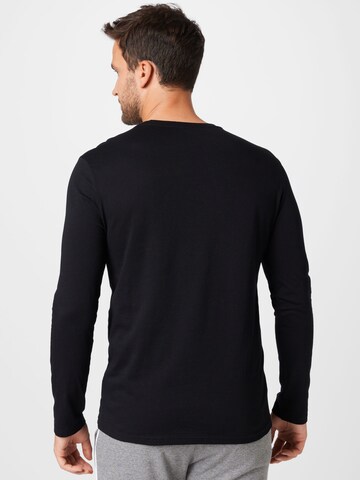 Maglietta di UNITED COLORS OF BENETTON in nero