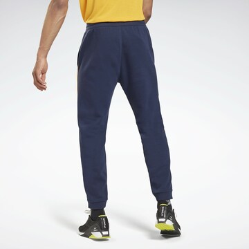 Reebok Tapered Sportbroek in Blauw