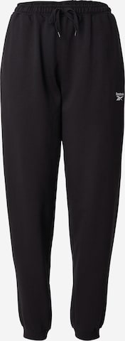 ReebokTapered Hlače - crna boja: prednji dio