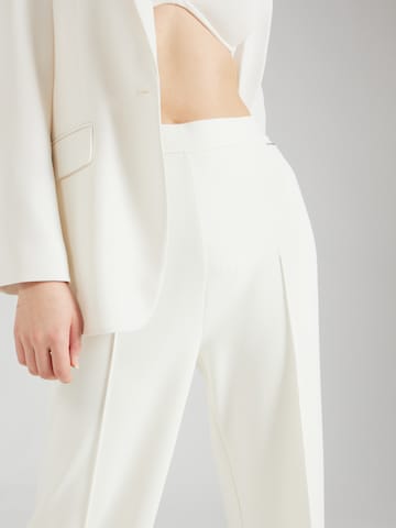 Calvin Klein - Pierna ancha Pantalón de pinzas en blanco
