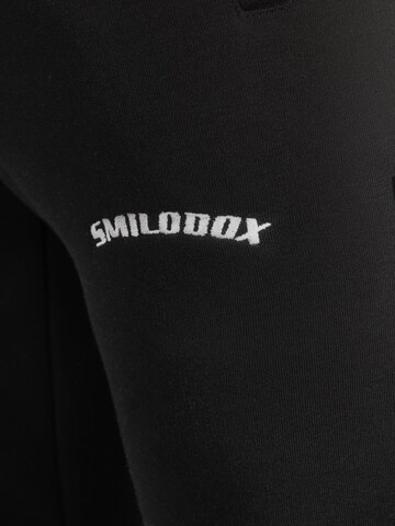 Coupe slim Pantalon 'Merrick' Smilodox en noir