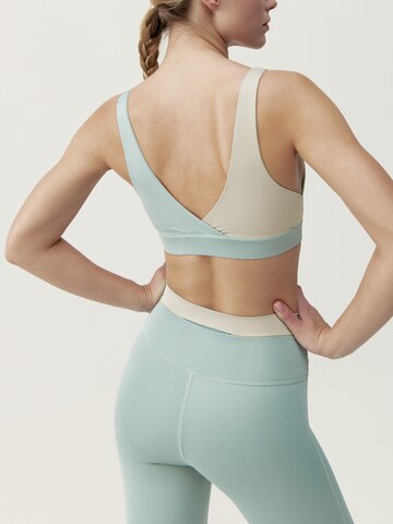 Born Living Yoga Sporttop 'Duo' in Groen