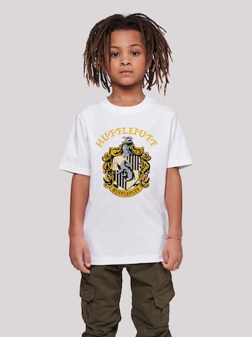 T-Shirt 'Harry Potter Hufflepuff Crest' F4NT4STIC en blanc : devant