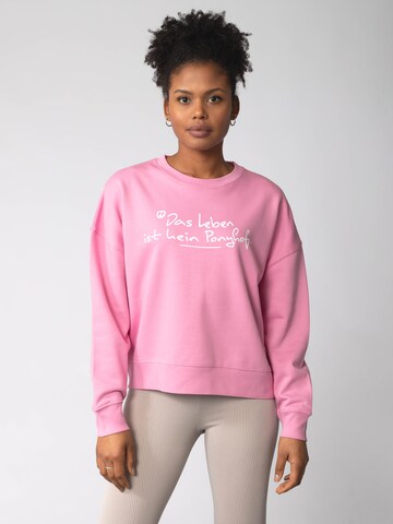 Watapparel Sweatshirt 'Das Leben ist kein Ponyhof ' in Roze: voorkant