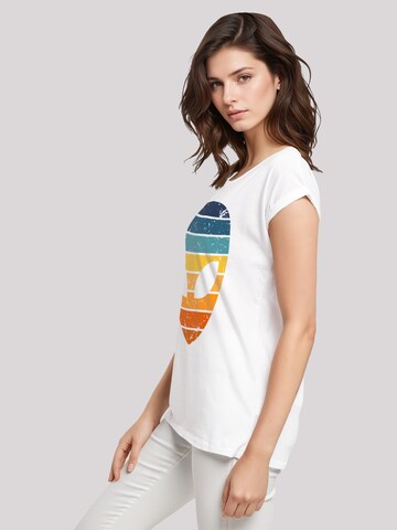 T-shirt 'Alien Sonnenuntergang Retro' F4NT4STIC en blanc