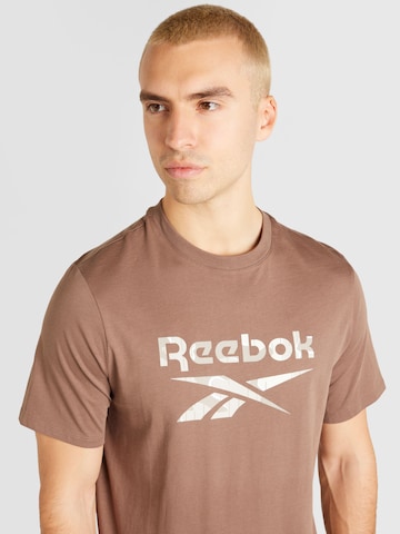 Reebok Λειτουργικό μπλουζάκι 'MOTION' σε καφέ