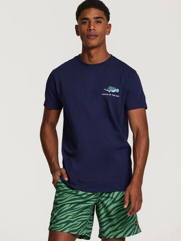 Shiwi T-Shirt 'CATCH OF THE DAY' in Blau: predná strana