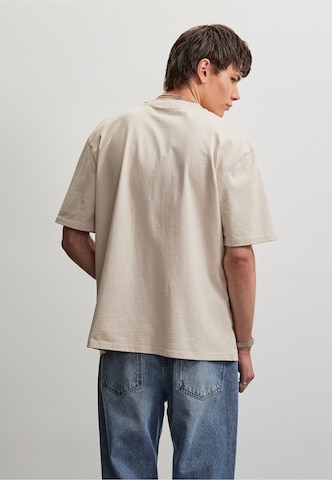 T-Shirt 'Signar' Pegador en beige