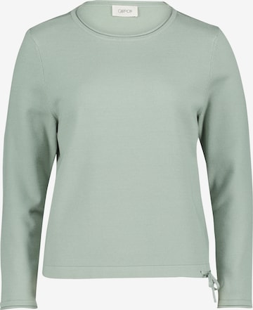 Cartoon Strickpullover mit Rundhalsausschnitt in Grün: Vorderseite