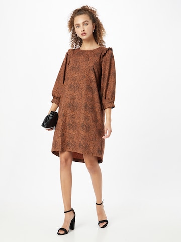 Robe Coster Copenhagen en marron