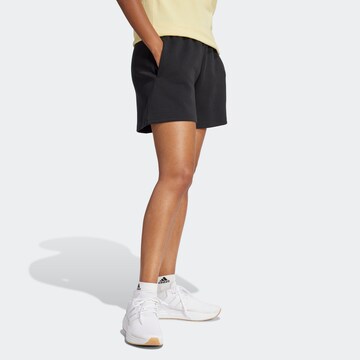 ADIDAS SPORTSWEAR - Loosefit Pantalón deportivo 'Future Icons' en negro