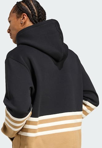 ADIDAS ORIGINALS Collegepaita 'Archive Cutline' värissä musta
