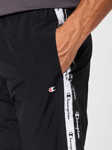 Champion Authentic Athletic Apparel Normalny krój Spodnie sportowe w kolorze czarny