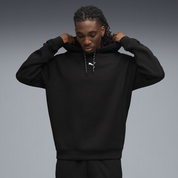 PUMA Sportsweatshirt in Zwart: voorkant