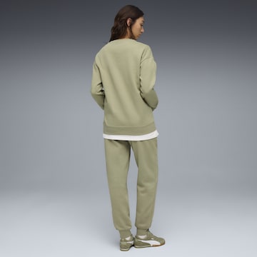 PUMA Joggingpak in Groen