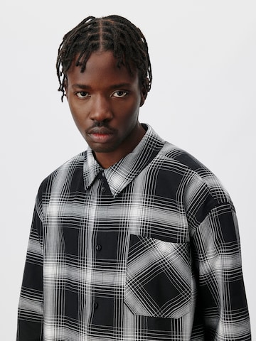 ABOUT YOU x Kingsley Coman Regular fit Button Up Shirt 'Nils' in Black