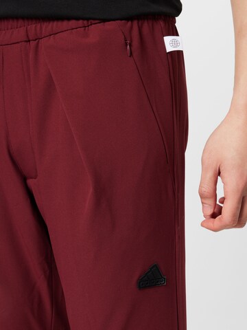 ADIDAS SPORTSWEARTapered Sportske hlače 'City Escape' - crvena boja