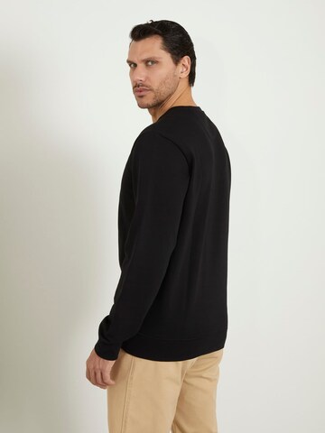 GUESS Sweatshirt in Schwarz