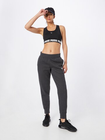 PUMA Tapered Workout Pants 'Essentials' in Grey