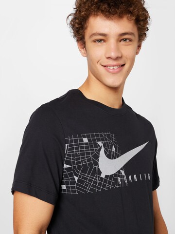 NIKE - Camiseta funcional en negro