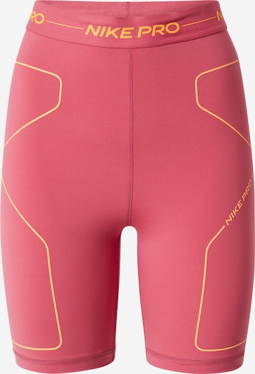 NIKE Pantalon de sport en orange clair / framboise, Vue avec produit