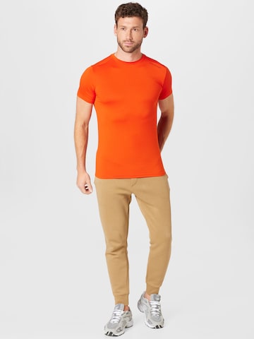 ENDURANCE - Camisa funcionais 'Hubend' em laranja