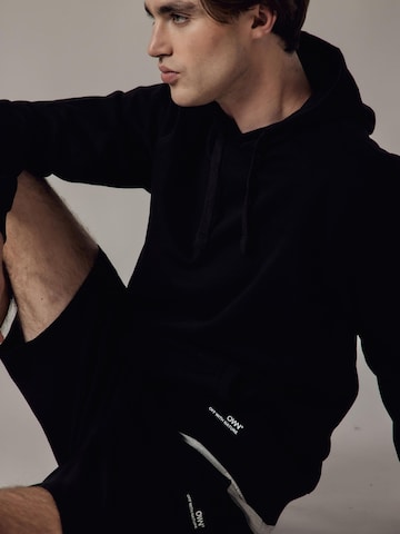 OWN Off With Nature Sweatshirt 'Felpa con Cappuccio' in Black
