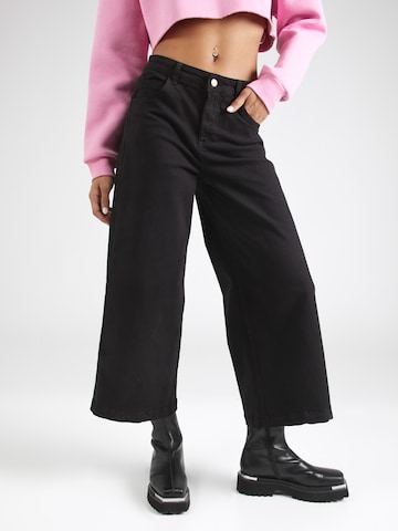 Wide leg Jeans de la Blutsgeschwister pe negru: față