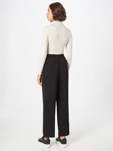 ABOUT YOU Loose fit Trousers 'Ida' in Black