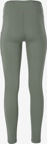 ENDURANCE Skinny Spodnie sportowe 'THADEA' w kolorze zielony