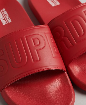 Claquettes / Tongs Superdry en rouge