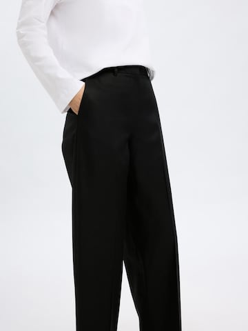 Loosefit Pantaloni con piega frontale di SELECTED in nero