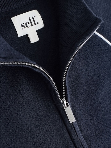 Veste de survêtement self. en bleu
