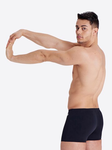 Pantaloncini da bagno 'TEAM SOLID' di ARENA in nero