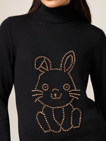Pullover di oltre in nero