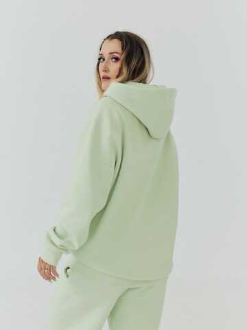 ABOUT YOU x Sharlota Sweatshirt 'Sharlota' in Green