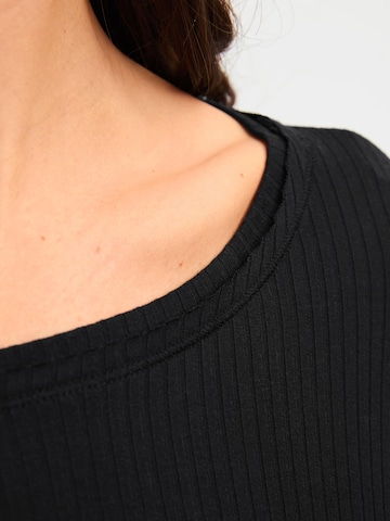 CALIDA Slaapshirt 'Feminine Lounge' in Zwart