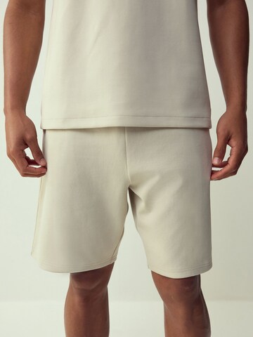 Next regular Bukser i grå