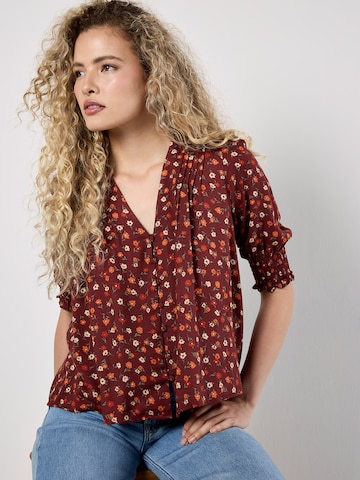 Chemisier Apricot en rouge