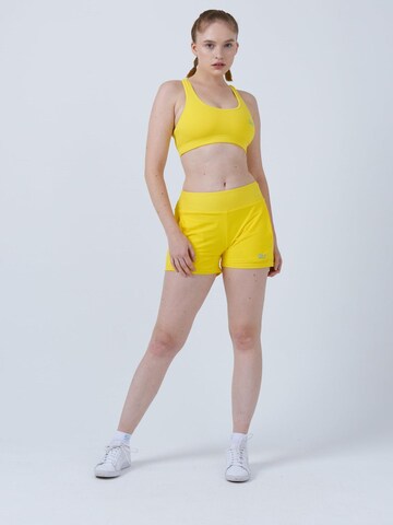 SPORTKIND Regular Sporthose 'Advantage Shorts mit Ballhalter'‌‌ in Gelb