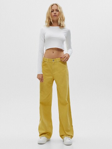 Pull&Bear Wide leg Trousers in Yellow: front