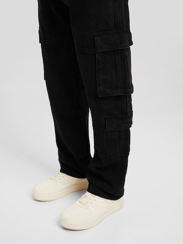 Loosefit Jeans cargo Bershka en noir