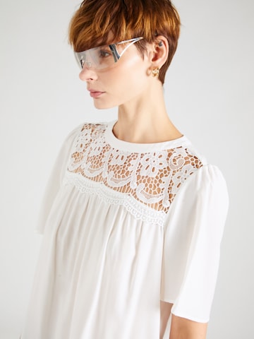 QS - Blusa en blanco