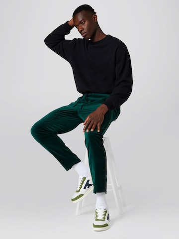 Sinned x ABOUT YOU Regular Pants 'Luca' in Green