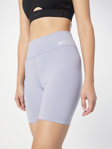 NIKE - Skinny Calças de desporto em cinzento