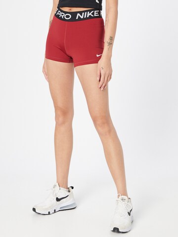 NIKE Skinny Sports trousers 'Pro' in Red: front