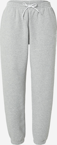 ReebokTapered Sportske hlače - siva boja: prednji dio