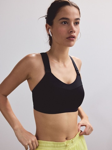 Bustino Reggiseno sportivo 'Zero Bounce' di Next in nero: frontale