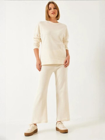Bianco Lucci Pantsuit in Beige: front
