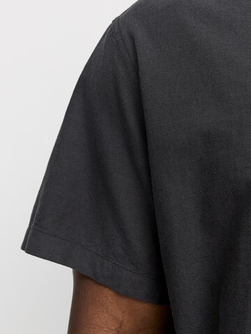 Coupe slim Chemise 'JJEBreeze' Jack & Jones Plus en noir